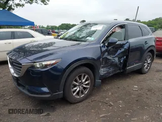 2019 Mazda CX-9 Touring with VIN JM3TCBCY6K0334898, listed as a IAAI auction lot 42467677 with 69,454 mi miles and . Bid and sale history available at DreamBid. Image 2.