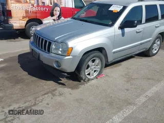 2007 Jeep Grand Cherokee Laredo z VIN 1J8GR48K67C543257, wystawiony jako IAAI lot #41733644 z przebiegiem 201 936 mil mil oraz . Historia ofert i sprzedaży dostępna na DreamBid. Obrazek 6.