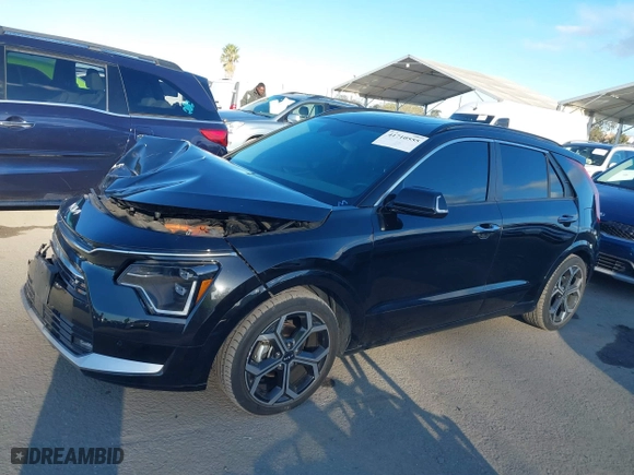 2023 Kia Niro SX Touring with VIN KNDCT3LE6P5038102, listed as a IAAI auction lot 41710555 with 57,669 mi miles. Bid and sale history available at carsss.com. Image 14.