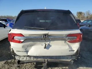 2018 Honda Odyssey Touring с VIN 5FNRL6H8XJB002031, выставлен на аукционе Copart как лот 49996105 с пробегом 202 284 миль миль и Чистый • Clean title. История ставок и продаж доступна на DreamBid. Изображение 6.
