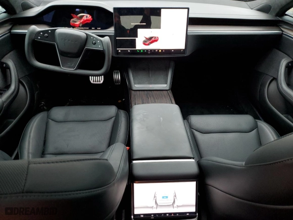 2024 Tesla Model S with VIN 5YJSA1E52RF537354, listed as a Copart auction lot 43077365 with 8,934 mi miles and Salvage Title. Bid and sale history available at carsss.com. Image 8.