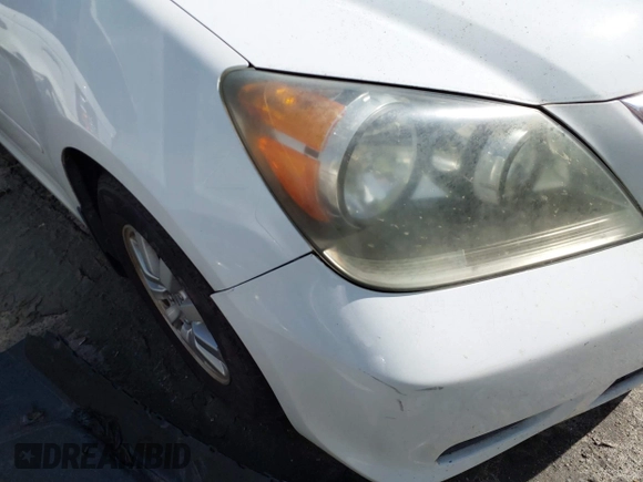 2009 Honda Odyssey EX-L with VIN 5FNRL38799B404379, listed as a IAAI auction lot 41990398 with 224,859 mi miles and . Bid and sale history available at DreamBid. Image 6.