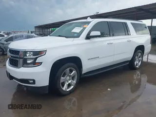 2018 Chevrolet Suburban LT with VIN 1GNSCHKC2JR376239, listed as a IAAI auction lot 42110551 with 123,694 mi miles and . Bid and sale history available at DreamBid. Image 2.