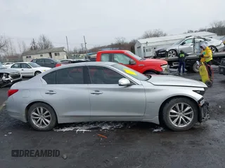 2014 Infiniti Q50 Hybrid Premium with VIN JN1AV7AR9EM700727, listed as a IAAI auction lot 41461433 with 169,882 mi miles. Bid and sale history available at carsss.com. Image 13.