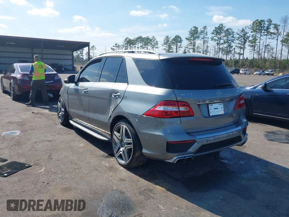 2013 Mercedes-Benz M ML 63 AMG with VIN 4JGDA7EB9DA155725, listed as a IAAI auction lot 41502675 with 64,849 mi miles. Bid and sale history available at carsss.com. Image 3.