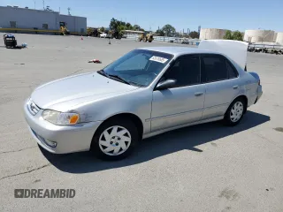 2001 Toyota Corolla CE with VIN 1NXBR12E01Z508679, listed as a Copart auction lot 63618685 with 244,546 mi miles and Salvage title. Bid and sale history available at DreamBid. Image 1.