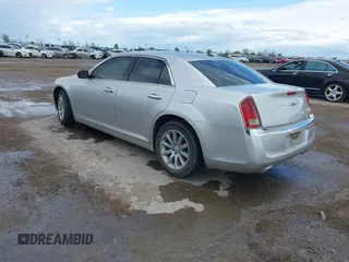 2012 Chrysler 300 Limited with VIN 2C3CCACGXCH212881, listed as a IAAI auction lot 41882643 with 160,645 mi miles. Bid and sale history available at carsss.com. Image 3.