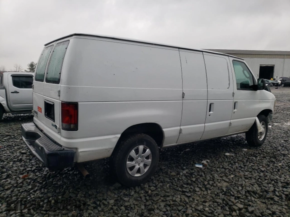 2013 Ford Econoline Cargo Commercial с VIN 1FTNE2EW8DDB03942, выставлен на аукционе Copart как лот 81302434 с пробегом 126 461 миль миль и Списание • Salvage title. История ставок и продаж доступна на DreamBid. Изображение 3.