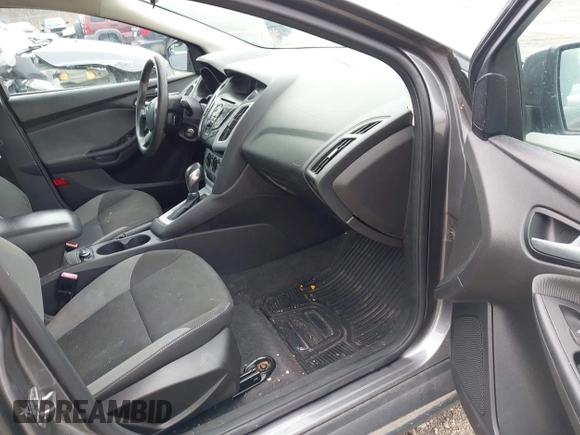 2012 Ford Focus SE with VIN 1FAHP3F21CL415006, listed as a IAAI auction lot 42073643 with 168,516 mi miles. Bid and sale history available at carsss.com. Image 5.