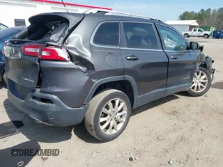 2014 Jeep Cherokee Limited with VIN 1C4PJLDS4EW283855, listed as a IAAI auction lot 41840848 with 143,686 mi miles. Bid and sale history available at carsss.com. Image 4.