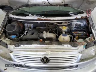 2003 Volkswagen EuroVan MV с VIN WV2NB47073H001005, выставлен на аукционе Copart как лот 87284844 с пробегом 283 979 миль миль и Чистый • Clean title. История ставок и продаж доступна на DreamBid. Изображение 12.