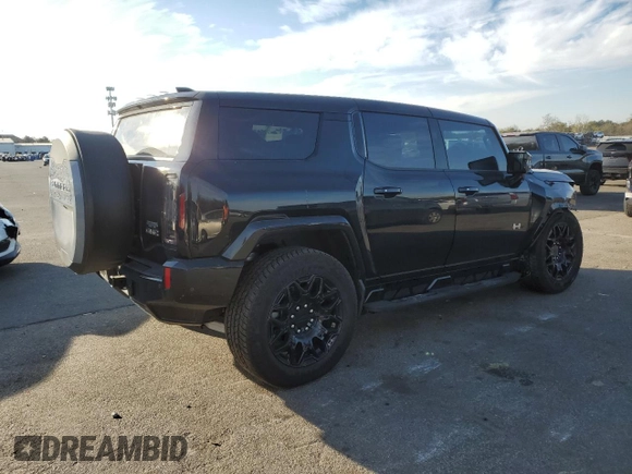 2024 GMC Hummer EV 2X z VIN 1GKB0NDE4RU104402, wystawiony jako Copart lot #88446255 z przebiegiem 15 506 mil mil oraz Szkody całkowita. Historia ofert i sprzedaży dostępna na DreamBid. Obrazek 3.