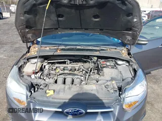 2013 Ford Focus SE with VIN 1FADP3F26DL135579, listed as a IAAI auction lot 41951255 with 100,000 mi miles and . Bid and sale history available at carsss.com. Image 10.