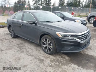 2022 Volkswagen Passat 2.0T SE with VIN 1VWSA7A3XNC000436, listed as a IAAI auction lot 41838518 with 52,263 mi miles. Bid and sale history available at carsss.com. Image 1.