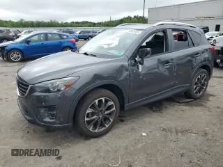 2016 Mazda CX-5 Grand Touring z VIN JM3KE4DY5G0741800, wystawiony jako Copart lot #58565455 z przebiegiem 33 675 mil mil oraz Szkoda całkowita • Salvage title. Historia ofert i sprzedaży dostępna na DreamBid. Obrazek 1.