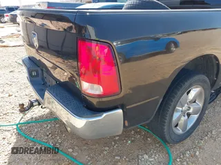 2014 Ram 1500 Big Horn with VIN 1C6RR6LT7ES229297, listed as a IAAI auction lot 42387218 with 99,811 mi miles and . Bid and sale history available at DreamBid. Image 18.