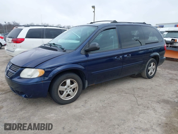 2005 Dodge Caravan SXT with VIN 2D4GP44L75R114843, listed as a IAAI auction lot 41644975 with 128,767 mi miles and . Bid and sale history available at DreamBid. Image 2.