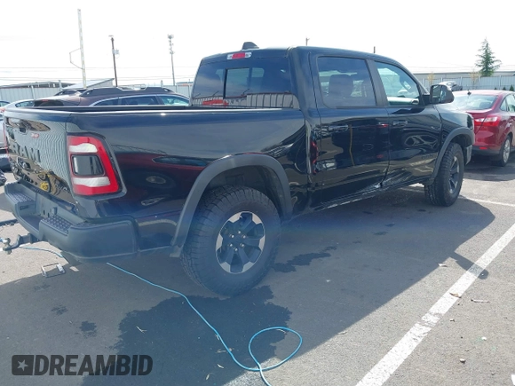 2019 Ram 1500 Rebel with VIN 1C6SRFLT2KN592652, listed as a IAAI auction lot 41989054 with 71,630 mi miles and . Bid and sale history available at DreamBid. Image 4.