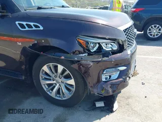 2015 Infiniti QX80 with VIN JN8AZ2NC4F9370790, listed as a IAAI auction lot 41985910 with 125,615 mi miles. Bid and sale history available at carsss.com. Image 6.
