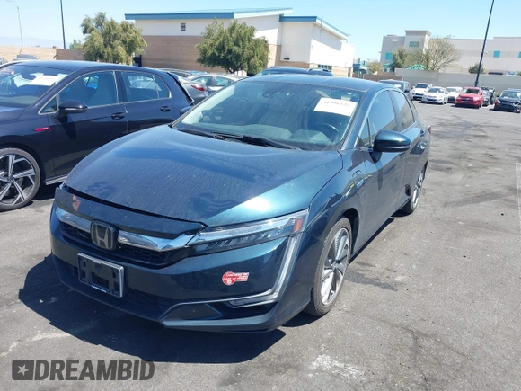 2018 Honda Clarity Touring with VIN JHMZC5F3XJC006383, listed as a IAAI auction lot 41996524 with 100,646 mi miles and . Bid and sale history available at DreamBid. Image 17.