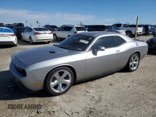 2013 Dodge Challenger R/T with VIN 2C3CDYBT2DH591381, listed as a Copart auction lot 49110375 with 129,876 mi miles and Clean Title. Bid and sale history available at carsss.com. Image 1.