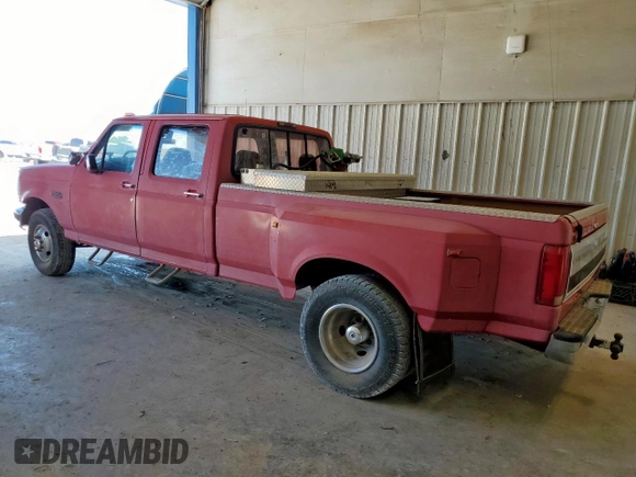 1995 Ford F-350 with VIN 1FTJW35F5SEA46141, listed as a Copart auction lot 63977585 with 386,819 mi miles and Salvage title. Bid and sale history available at DreamBid. Image 2.