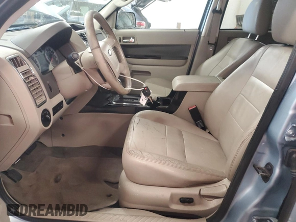 2009 Ford Escape Hybrid with VIN 1FMCU49399KA29841, listed as a Copart auction lot 64803435 with 131,289 mi miles and Salvage title. Bid and sale history available at DreamBid. Image 7.