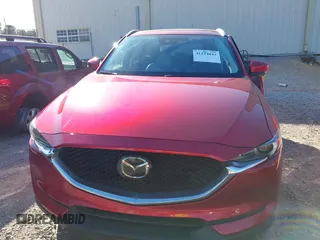 2020 Mazda CX-5 Grand Touring with VIN JM3KFADM8L0846818, listed as a IAAI auction lot 41224843 with 123,554 mi miles. Bid and sale history available at carsss.com. Image 13.