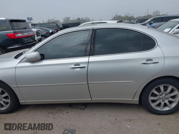 2003 Lexus ES 300 with VIN JTHBF30G730114098, listed as a IAAI auction lot 41793862 with 162,984 mi miles and . Bid and sale history available at DreamBid. Image 14.
