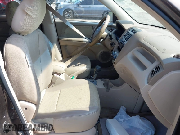 2005 Kia Sportage LX with VIN KNDJF723557133872, listed as a IAAI auction lot 42203702 with 181,132 mi miles and . Bid and sale history available at carsss.com. Image 5.