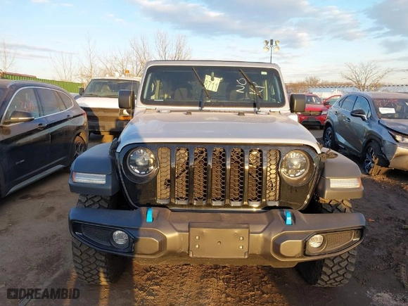 2023 Jeep Wrangler 4xe with VIN 1C4JJXN65PW612855, listed as a IAAI auction lot 41285856 with 11,868 mi miles. Bid and sale history available at carsss.com. Image 12.