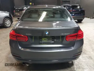 2018 BMW 3 Series 330i xDrive with VIN WBA8D9C51JEM34061, listed as a IAAI auction lot 42682318 with 65,245 mi miles and . Bid and sale history available at DreamBid. Image 16.
