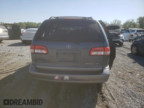 2002 Toyota Sienna LE with VIN 4T3ZF13C22U497021, listed as a Copart auction lot 52571055 with 232,973 mi miles and Salvage Title. Bid and sale history available at DreamBid. Image 6.
