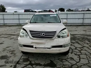 2003 Lexus GX 470 z VIN JTJBT20X330006191, wystawiony jako Copart lot #53516235 z przebiegiem 146 860 mil mil oraz Szkoda całkowita • Salvage title. Historia ofert i sprzedaży dostępna na DreamBid. Obrazek 12.