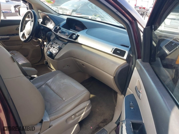 2011 Honda Odyssey Touring with VIN 5FNRL5H97BB008759, listed as a IAAI auction lot 41567010 with 215,709 mi miles. Bid and sale history available at carsss.com. Image 5.