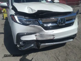 2019 Honda Pilot Touring 8-Passenger with VIN 5FNYF5H91KB038679, listed as a IAAI auction lot 40200012 with 70,582 mi miles. Bid and sale history available at carsss.com. Image 6.