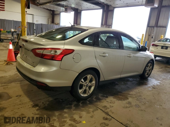 2013 Ford Focus SE z VIN 1FADP3F26DL314690, wystawiony jako Copart lot #58408575 z przebiegiem Nie podano mil oraz Szkoda całkowita • Salvage title. Historia ofert i sprzedaży dostępna na DreamBid. Obrazek 3.