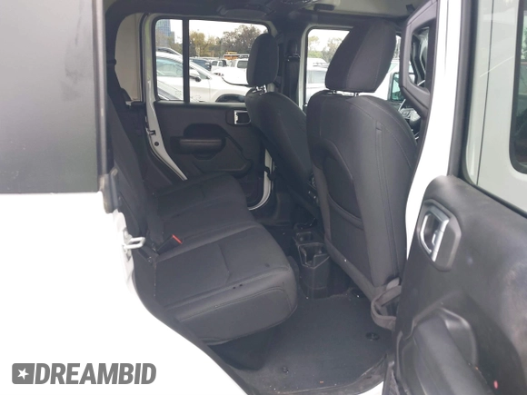 2022 Jeep Gladiator Willys with VIN 1C6HJTAG1NL148524, listed as a IAAI auction lot 41507693 with 42,004 mi miles and . Bid and sale history available at DreamBid. Image 8.