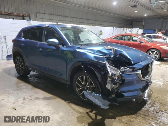 2018 Mazda CX-5 Grand Touring with VIN JM3KFBDM1J0304706, listed as a Copart auction lot 46123415 with 104,004 mi miles and Salvage title. Bid and sale history available at DreamBid. Image 4.