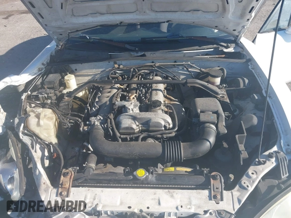 2003 Mazda MX-5 Miata Cloth z VIN JM1NB353730312566, wystawiony jako IAAI lot #41782864 z przebiegiem Nie podano mil oraz . Historia ofert i sprzedaży dostępna na DreamBid. Obrazek 10.