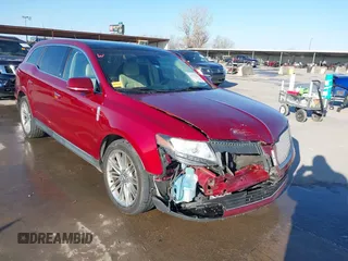 2014 Lincoln MKT EcoBoost with VIN 2LMHJ5AT1EBL50796, listed as a IAAI auction lot 41371551 with 163,932 mi miles and . Bid and sale history available at DreamBid. Image 1.