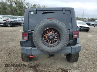 2018 Jeep Wrangler JK Unlimited Sport S with VIN 1C4BJWDG0JL818800, listed as a Copart auction lot 88286715 with 114,011 mi miles and Salvage Title. Bid and sale history available at carsss.com. Image 6.