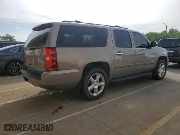 2007 Chevrolet Suburban LT с VIN 1GNFK16357J310782, выставлен на аукционе Copart как лот 54733695 с пробегом 313 324 миль миль и Списание • Salvage title. История ставок и продаж доступна на DreamBid. Изображение 3.