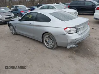 2014 BMW 4 Series 428i xDrive with VIN WBA3N5C53EF716542, listed as a IAAI auction lot 41157641 with 135,264 mi miles and . Bid and sale history available at DreamBid. Image 3.