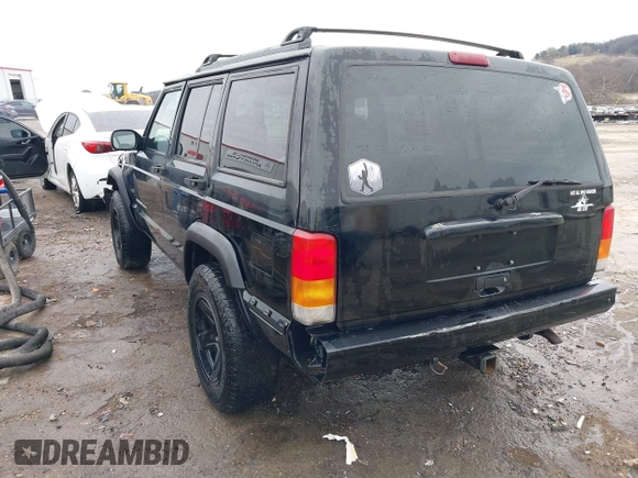 1999 Jeep Cherokee Sport with VIN 1J4FT68S6XL598558, listed as a IAAI auction lot 41549504 with 238,004 mi miles. Bid and sale history available at carsss.com. Image 3.
