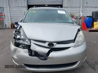 2008 Toyota Sienna XLE with VIN 5TDZK22C38S151671, listed as a IAAI auction lot 41046569 with 119,239 mi miles. Bid and sale history available at carsss.com. Image 12.