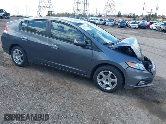 2013 Honda Insight EX z VIN JHMZE2H71DS004170, wystawiony jako IAAI lot #41971733 z przebiegiem 174 000 mil mil oraz . Historia ofert i sprzedaży dostępna na DreamBid. Obrazek 1.