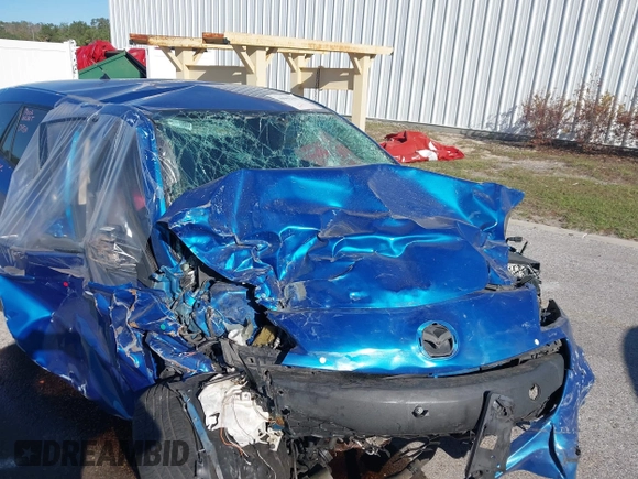 2012 Mazda Mazda3 i Touring with VIN JM1BL1L70C1674419, listed as a IAAI auction lot 40902429 with Not Provided miles. Bid and sale history available at carsss.com. Image 6.