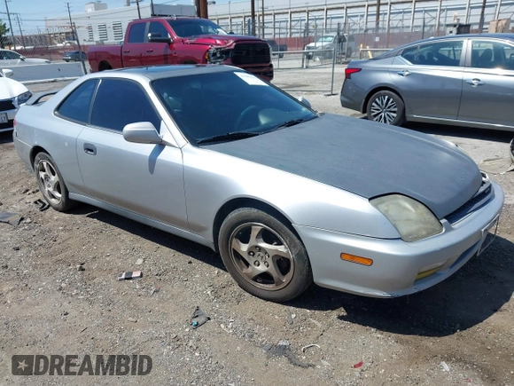 2001 Honda Prelude with VIN JHMBB62421C003129, listed as a IAAI auction lot 41989431 with 225,130 mi miles and . Bid and sale history available at DreamBid. Image 1.