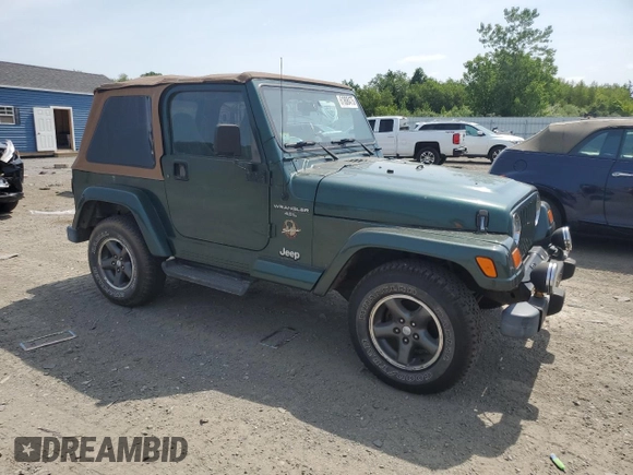 1999 Jeep Wrangler Sahara z VIN 1J4FY49S0XP453920, wystawiony jako Copart lot #61808475 z przebiegiem 129 062 mil mil oraz Czysty tytuł • Clean title. Historia ofert i sprzedaży dostępna na DreamBid. Obrazek 4.